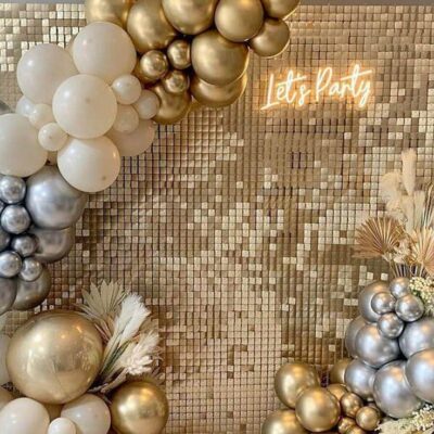 White Gold Shimmer backdrop and Organic balloon Arch
